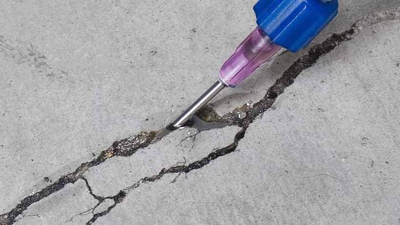 Patching cracks in concrete
